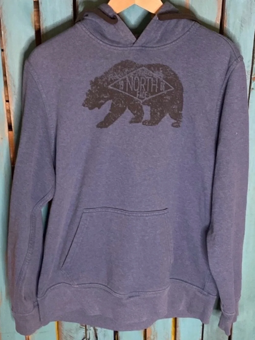 The North Face hoodie sweatshirt size large blue with black bear logo